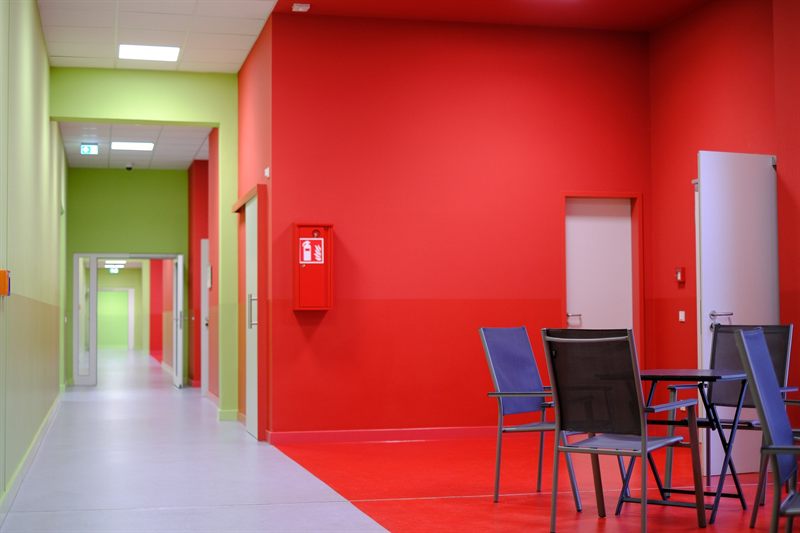 Foyer with seating next to the corridor